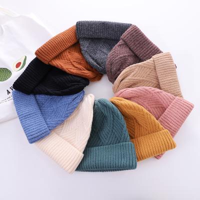 China Popular Top Selling Brimming Polyester Beanie Hat Knitted Winter Simple Diamond Shaped Wool Hat Warm for sale