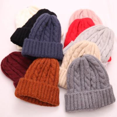 China Wholesale Popular High Quality Cheap Custom Made Solid Color Twist Cap Winter Knitted Beanie Unisex Hats for sale