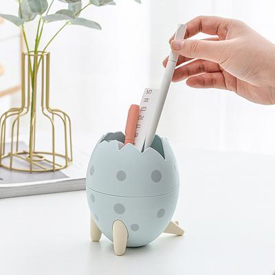 China Desktop Multi-Function Storage/Make Up Desk Pencil Holder Egg Tools Holder Dinosaur Storage Organizer Brush Container Home Decoration Cosmetic Accessories For Living Room for sale