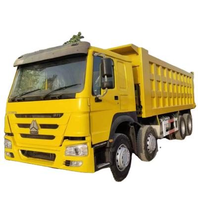 China RHD SINO HOWO 8X4 Heavy-duty Used Dump Tipper Truck G.V.W. 31T Gearbox FAST12JSXD240T for sale