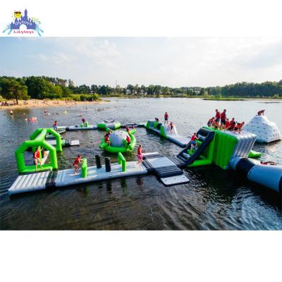 China Lilytoys Wholesale Outdoor Rental Aqua Park Inflatable Water Sports Obstacle Water Floating Equipment With Slide For Commercial Use for sale