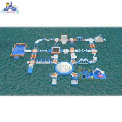 China Water Park Aquatic Outdoor Playground Inflatable Water Slides Aqua Equipment Children Water Play Equipment Floating Backyard for sale