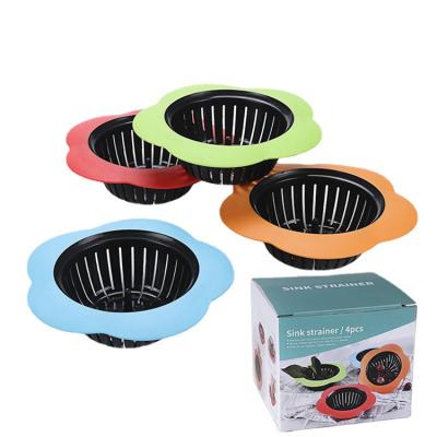 China Viable Plastic Plum Flower Floor Leakage For Kitchen Tools Ground Loss Pipe Filter Drain Plug Creative Floor Drain for sale