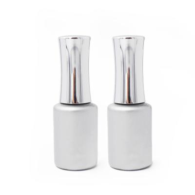 China Cosmetic Custom Design Glass Bottle Empty Nail Polish Bottle Gray Cylindrical Nail Polish Bottles With Brush for sale