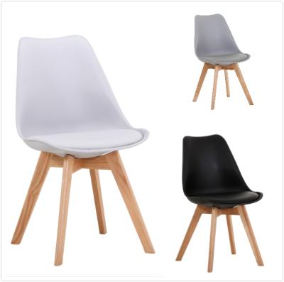 China Wooden Legs pp Tulip White Plastic Dining Chairs Modern Dining Room Furniture Colorful Classic Cushion Restaurant for sale