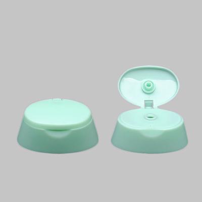 China Oval Flat Flip Top Cap For Shampoo Bottle Double Layer Flip Cap For Shower Gel Bottle for sale