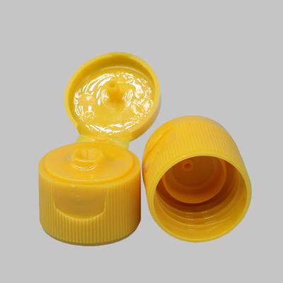 China OEM Flip Top Bottle Lids 20.3 Mm Height Yellow Color With Ribbed Wall for sale