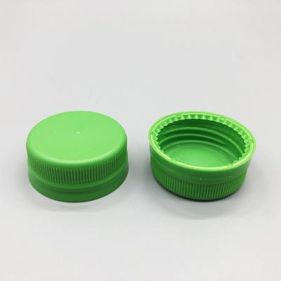 China Beverage Ribbed Plastic Water Bottle Caps Non Refillable With Liner for sale