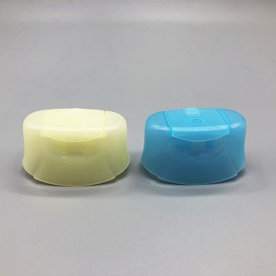 China Cruved Oval Flip Top Plastic Hair Shampoo Bottle Cap 20mm Snap Neck for sale