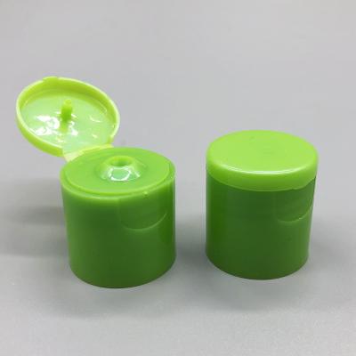 China 24/415 Green Color Polish Cosmetic Plastic Bottle Screw Flip Top Cap Cover for sale