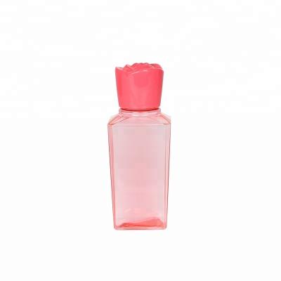 China Personal Care High Performance Rose Cap Bottle 100ml Mini PETG Plastic Cosmetic Portable Small Bottle For Cosmetic Use for sale