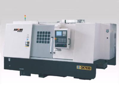 China Strength Dynamic and Static rigidity CNC Lathe Machine 380V with speed reducer for sale