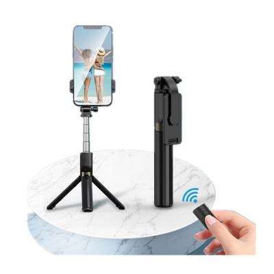 China Multifunctional High Quality Portable Flexible Stainless Steel Selfie Stick 360 Degree Rotation Selfie Stick Tripod With Blue Tooth Control for sale