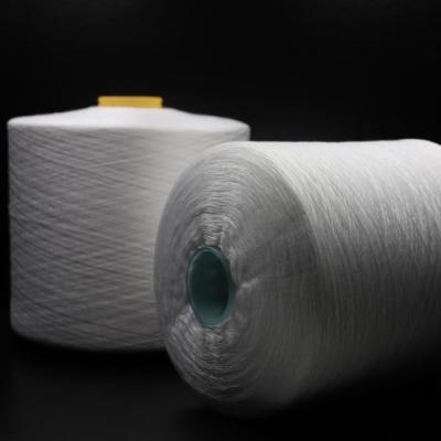 China Good Quality Elongation TUTON TFO Raw White Dye On Paper Cone Elongation Good 100% Polyester Sewing Yarn Dye Tube for sale