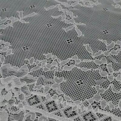 China 2021 Factory Price New Design Elastic TUTON Floral Elastic Lace Trim With Running Greige for sale