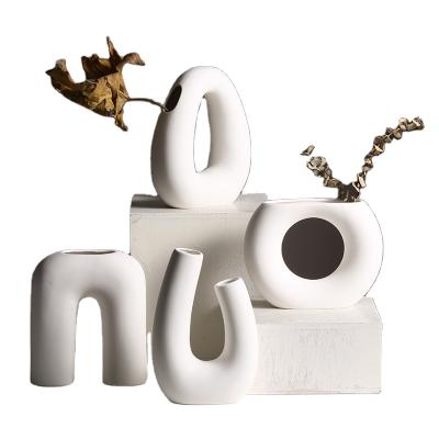 China Nordic minimalist creative geometric fakeflower vase ornaments ceramic flower vase for home decoration for sale