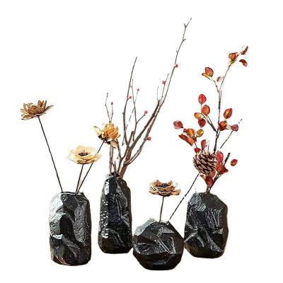 China Retro minimalist black stone shape table top open ceramic flower vase for home decoration for sale