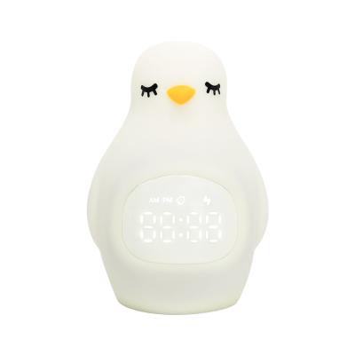 China Innovative Bedroom Baby Penguin LED Sunrise Digital Alarm Clock with Night Light Sleep Trainer Baby Nursery Night Light for sale