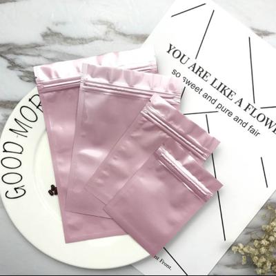 China Pink Color Printed Heat Seal Reusable Zipper Small Plastic Bags With Euro Hole for Makeup Tools Packaging for sale