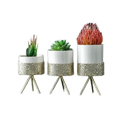 China Modern Retro Hollow Iron Frame Flower Pot Ceramic Nordic Home Decor Desktop Room Decoration Plant Storage Organizer Tank for sale