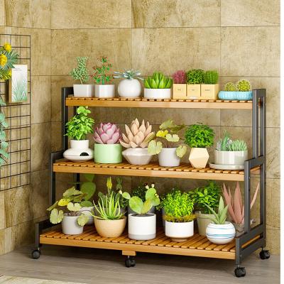 China Standing Type Indoor Plant Stand Tall Rack Flower Pot Organizer Outdoor Shelf for Multiple Plants Garden BAMBOO Material for sale