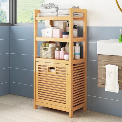 China Transform Your Bathroom Organization with Tilt-Out Laundry Hamper and Storage Shelf 50*40*30cm PP Plastic Type for sale