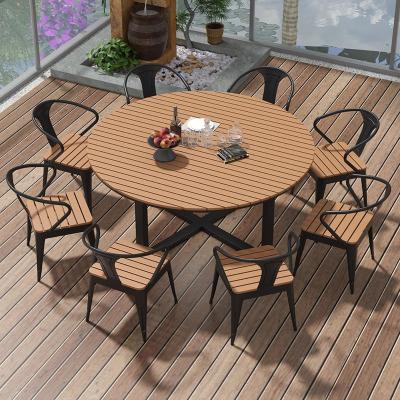 China Plastic Wood Outdoor Courtyard Round Tables Leisure Cafe Garden Furniture with Mail Packing and Wood-plastic Material for sale