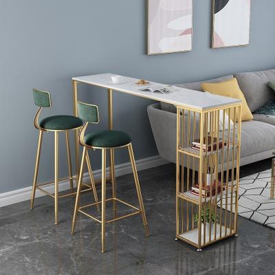 China Iron Metal Type Modern Apartment Dining Table with Storage and Comfortable Velvet Pad Chair High Bar Stools Footrest for sale