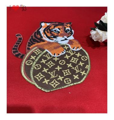 China Soft to touch baby tiger crawling on luis vitton bag patch for garment, exquisite patch material for sale