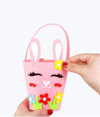 China 2022 Hot Sale DIY Felt + Fabric Easter Bunny Basket Sleep Tote Basket Bag Custom Easter Bunny Basket Bags Felt Bag Eggs Flocked Candy Easter Baskets for sale