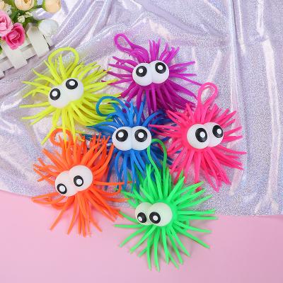 China Soft Light Up Puffer Ball With Furry Big Eye Strain Animal Kids Toy Stretchy Puffer Ball for sale