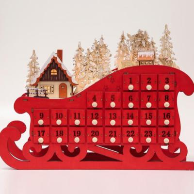 China low price christmas sleigh shape advent calendar with bo light red color 44x10x33.5 cm for sale