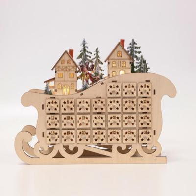 China low price Christmas sleigh shape advent calendar with soundtrack light with two houses on top 35.5x10.5x28.5 cm for sale