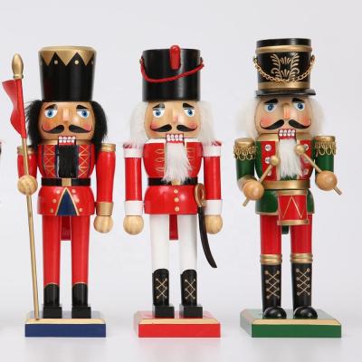 China 10 Inch Wooden Colorful Height Cheap Nutcracker Traditional Tradition for sale