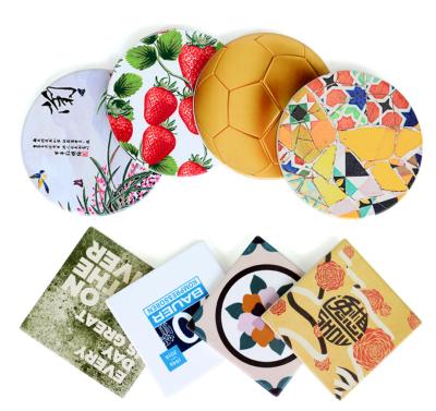 China Usmile Profit Ltd Sustainable Custom Round Water Absorbent Ceramic Coaster With Stand for sale