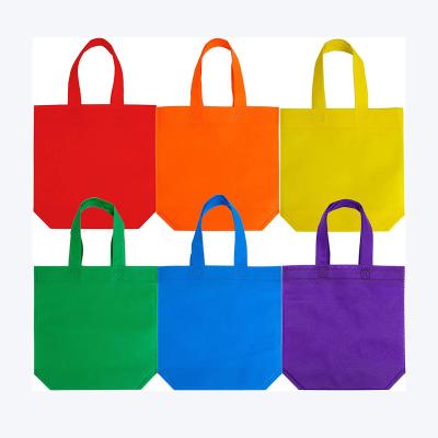 China Handled Tote Bags With Custom Printed Logo Gift Bag Non Woven Bottom With Handle Birthday Party Shopping Bags for sale