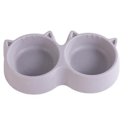 China Cute Low MOQ Dog Cat Plastic Feeder Water Food Sustainable Pet Double Bowl Dog Feeder for sale