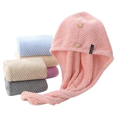 China Quick Dry Magic Hair Towel Microfiber Wrap Pineapple Microfiber Wrap Turban Bath Shower Head Quick Drying Towel With Buttons for sale