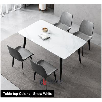 China Modern Modern Chair Set Combination White Black Small Family Simple Rectangular Faux Marble Stone Table Top Light Luxury Dining Table for sale