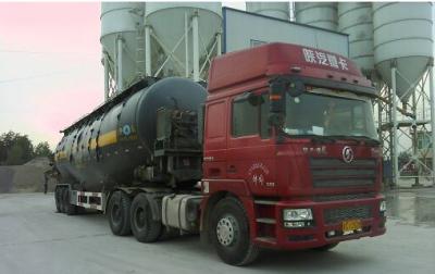 China Bulk het Cementvrachtwagen van de bodemlossing Semi met Aangepaste Compressor Te koop