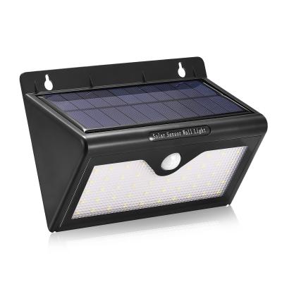 China Black Color Solar Powered Led Security Motion Detector Outdoor Light Automatically for sale