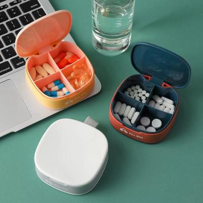 China Seven Day Small Medicine Dispenser Portable Mini Sealed Box Portable Hand Dispenser for sale