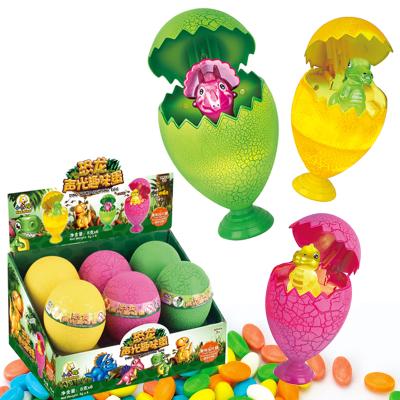 China Normal Candy Candy Toys 3 Styles Plastic Dino With Flashlight And Souds Surprise Candy Egg With Hard Candy for sale