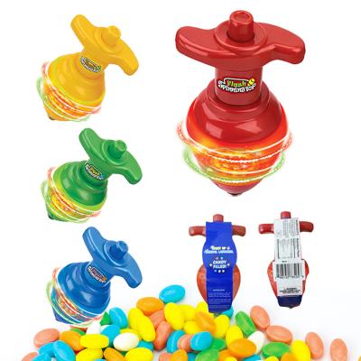 China Normal Hard Candy Fill Wholesale Kidsmania Flashing Magic Candy Toys Top/Spin Launcher Dreidel Spinning Toy Tops for sale