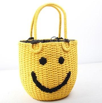 China 2022 Fashion Yujunbao Fashion Ins Bucket Bag Kawaii Bag Summer Smiling Handwoven Woven Beach Bag With Handle for sale