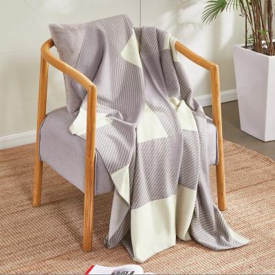 China Anti-pilling 55*80 Luxury Inches Geometric Pattern Fluffy Knitting Fur Throw Blanket Double Seat Couch Merino Wool Blanket For Bed for sale