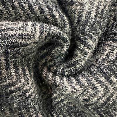 China Wholesale Custom Wrinkle Resistant Merino Wool Fabric 100% Herringbone Jacquard Knitted Yarn Dyed Fashion Fabric For Women Man Suit for sale