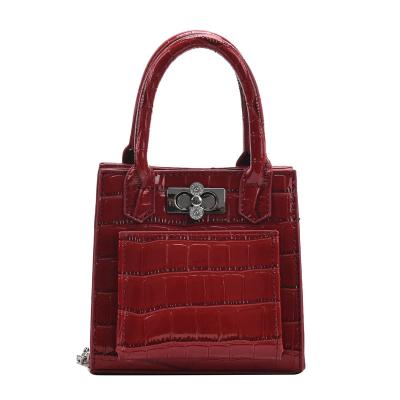 China Unique Handled Small PU Leather Handbags Designer Luxury Handbags Purses Women Patent Leather Women Handbags for sale