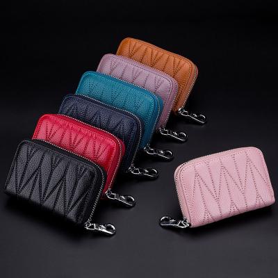 China Hot Selling RFID Mini Zipper Passport Purse Cheap Credit Wallet RFID Card Holders for sale