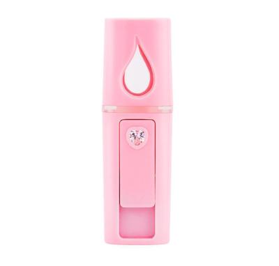 China Smell Comfortable Portable Car Humidifier Spray Mist Sprayer Rechargeable Handheld Nano Steamer for sale